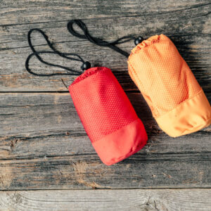 camping-waterproof-bag-orange-and-red-wrapped-up Τσάντα Πορτοκαλί