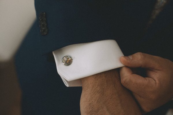 person-adjusts-cuff-of-a-crisp-white-shirt Πουκάμισο Λευκό 008