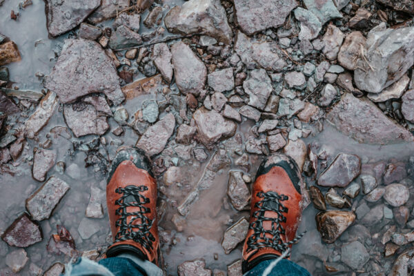 rugged-hiking-boots-stood-on-rocks Μπότες 007
