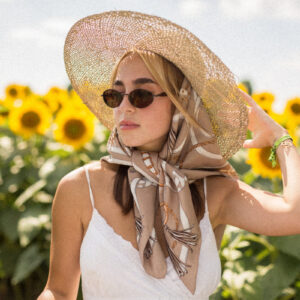 woman-wearing-a-silk-scarf-stands-in-a-field-of-sunflowers Κασκόλ 015